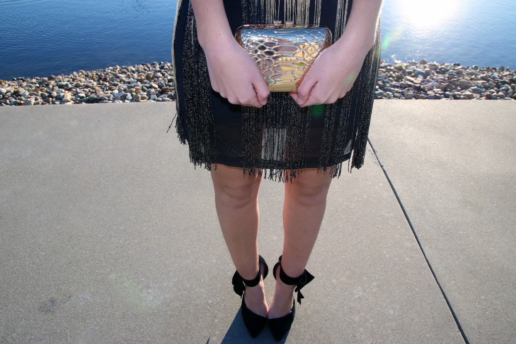 gold clutch, fringe