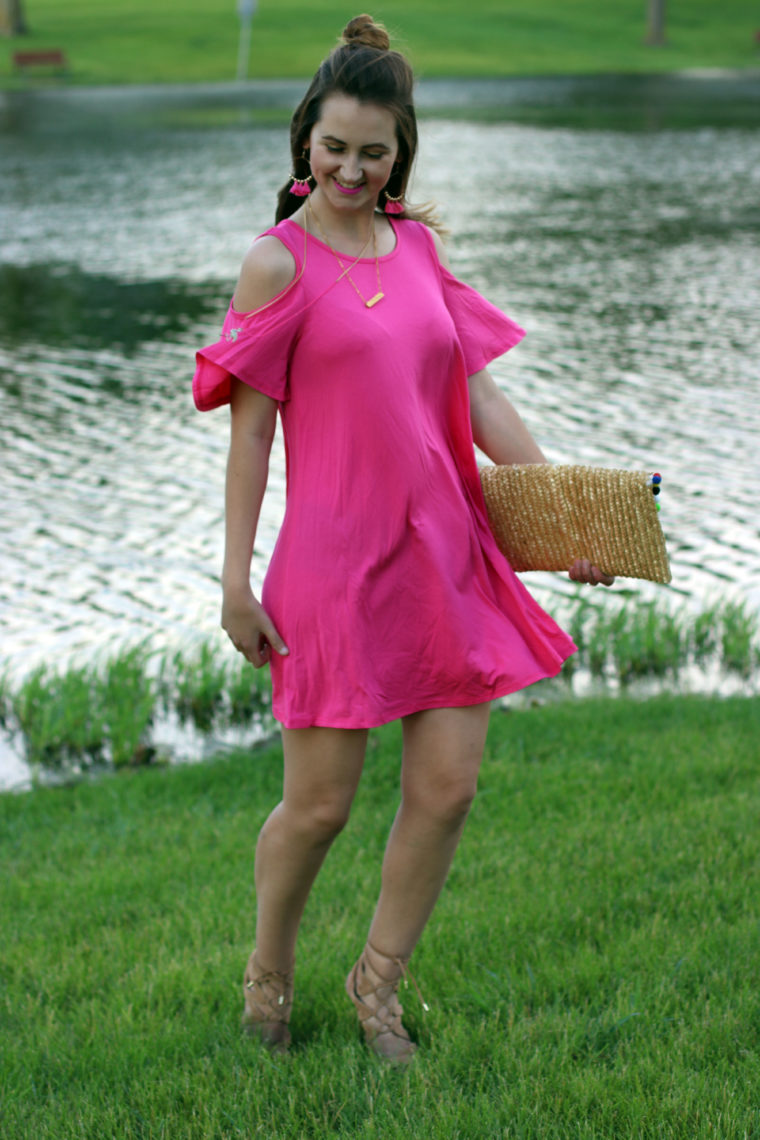 twirling, pink dress, beach look, pom pom clutch, summer, mid west blogger