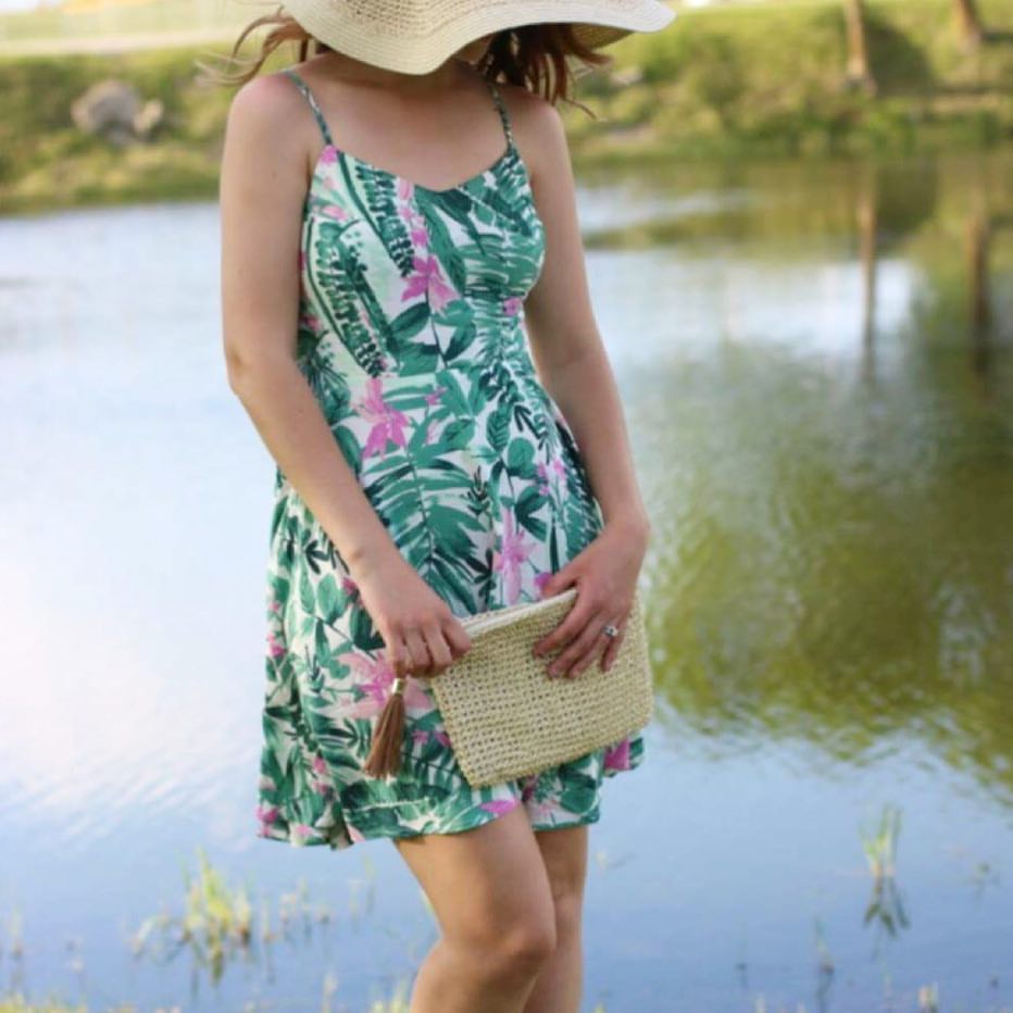 palm tree dress, floppy hat, tassel clutch