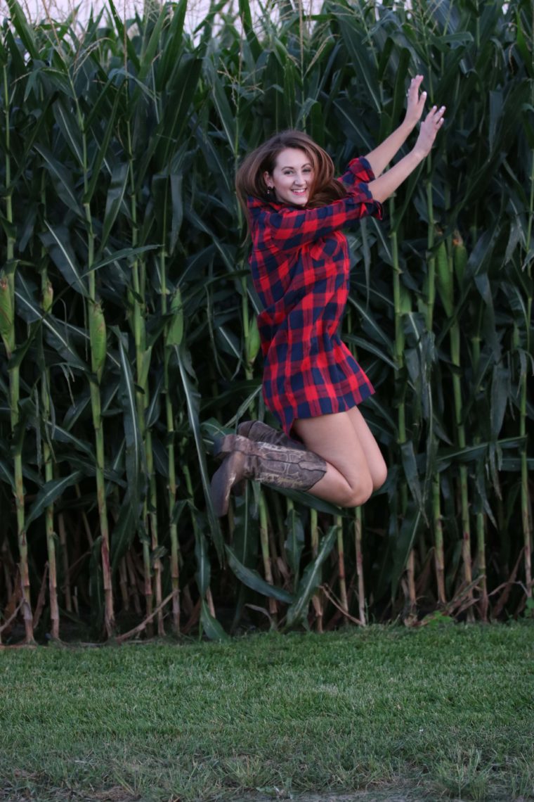 jumping, cowgirl boots, corn, tunic dress