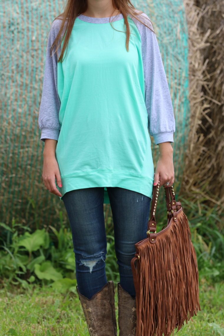 distressed denim, mint top, fringe bag