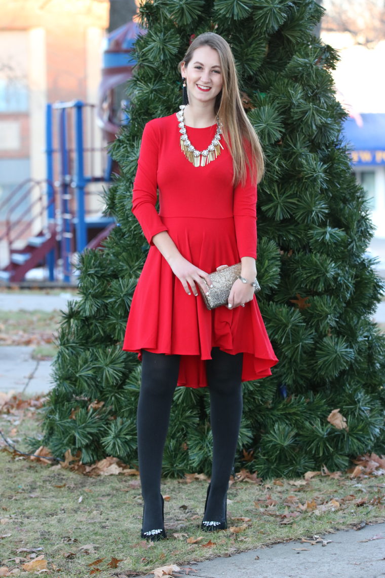 red dress, holiday look, statement necklace, gold clutch