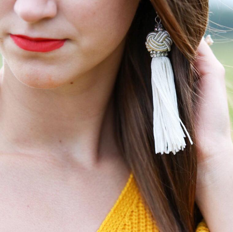 for the love of glitter, tassel earrings, red lip