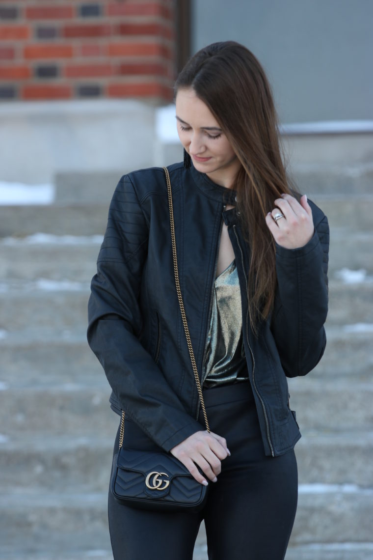 black moto jacket, black Gucci bag, NYE outfit