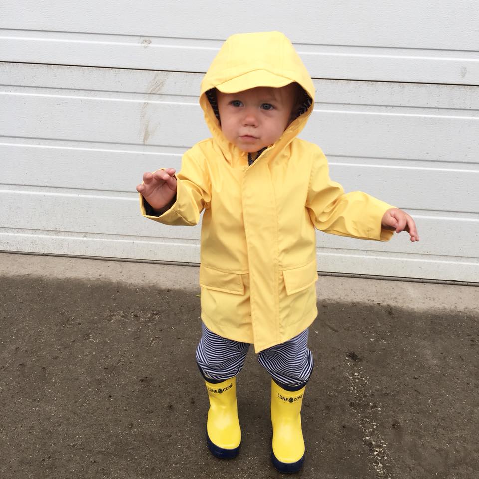 yellow rain jacket, yellow rainboots, rainy day