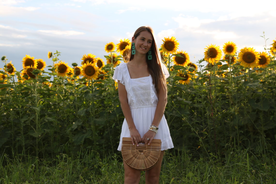 sunflower field, white ruffle romper, Cult Gaia bag