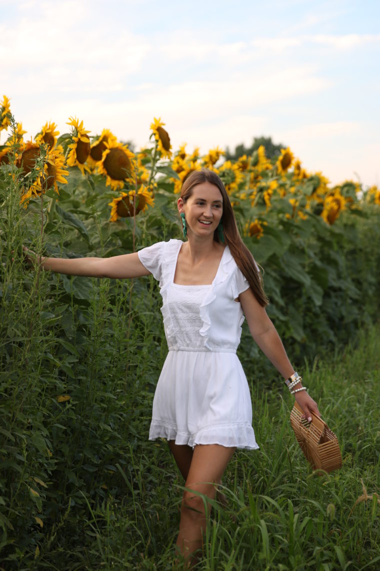 white ruffle romper, sunflower field, Cult Gaia bag