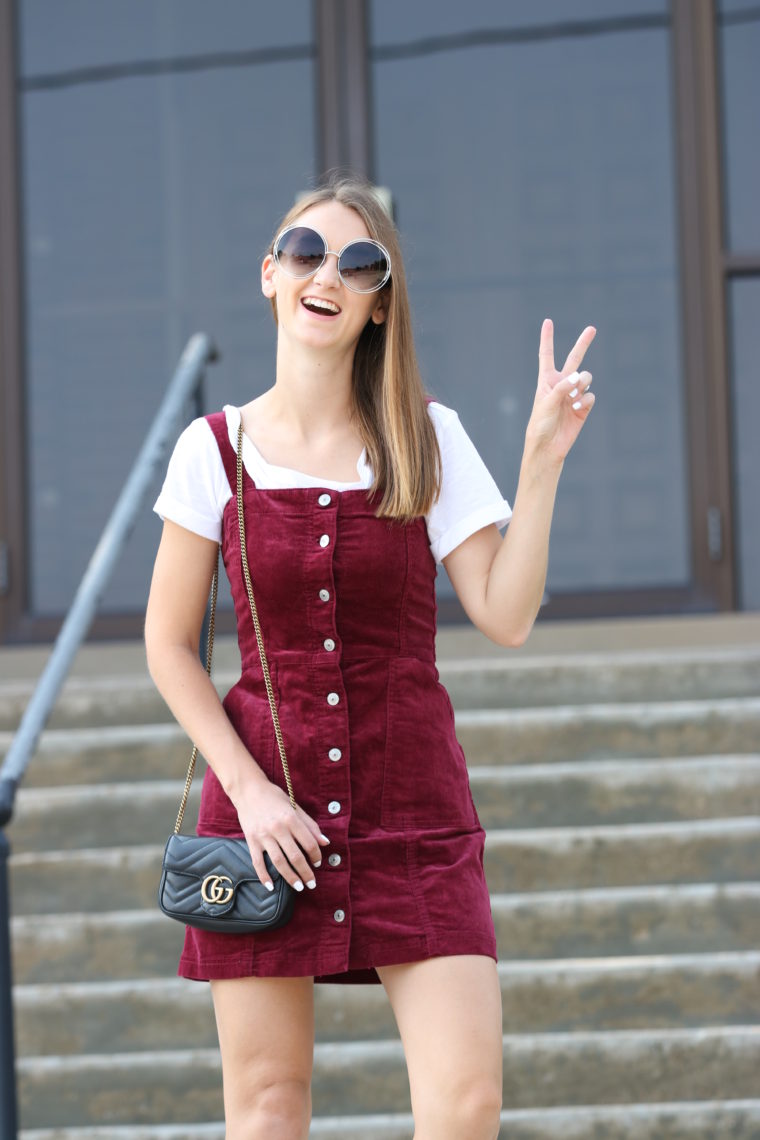 corduroy overall dress, big round sunglasses, fall style