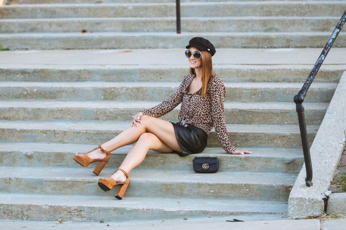 leopard tie front blouse, captain cap, platform heels, Gucci bag