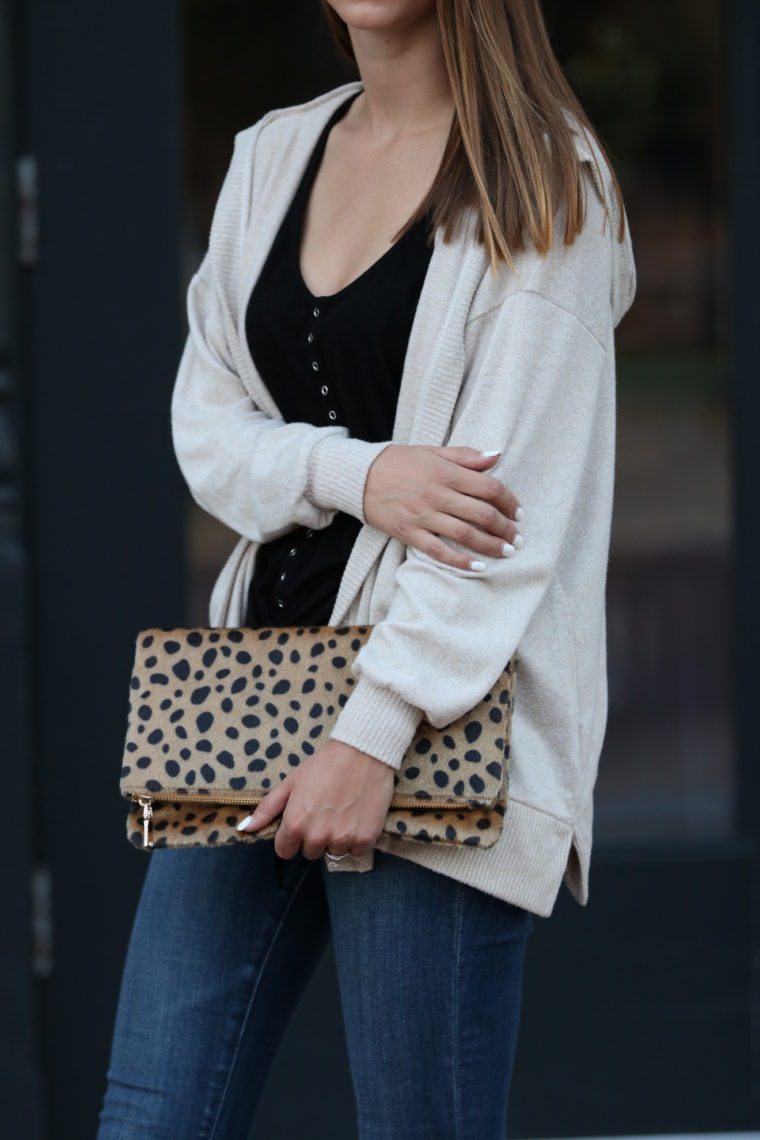 leopard clutch, cream cardigan, fall style
