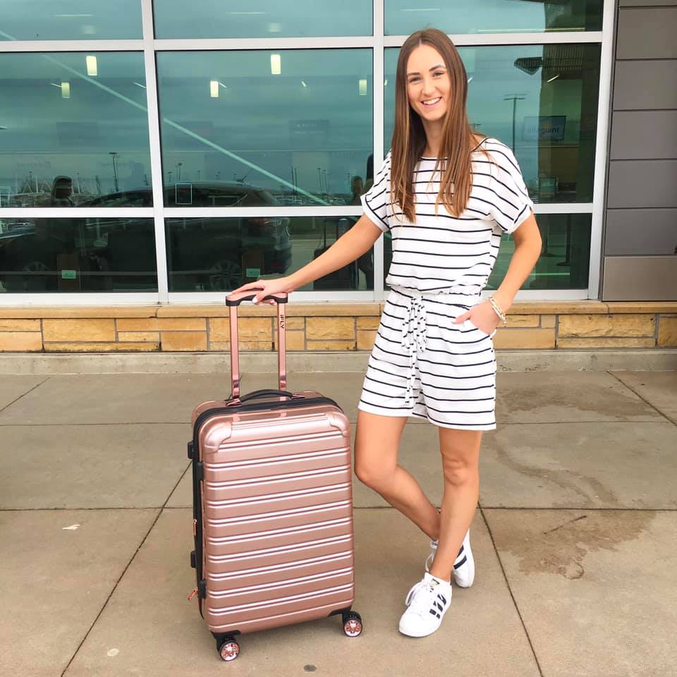 striped romper, travel style, rose gold suitcase