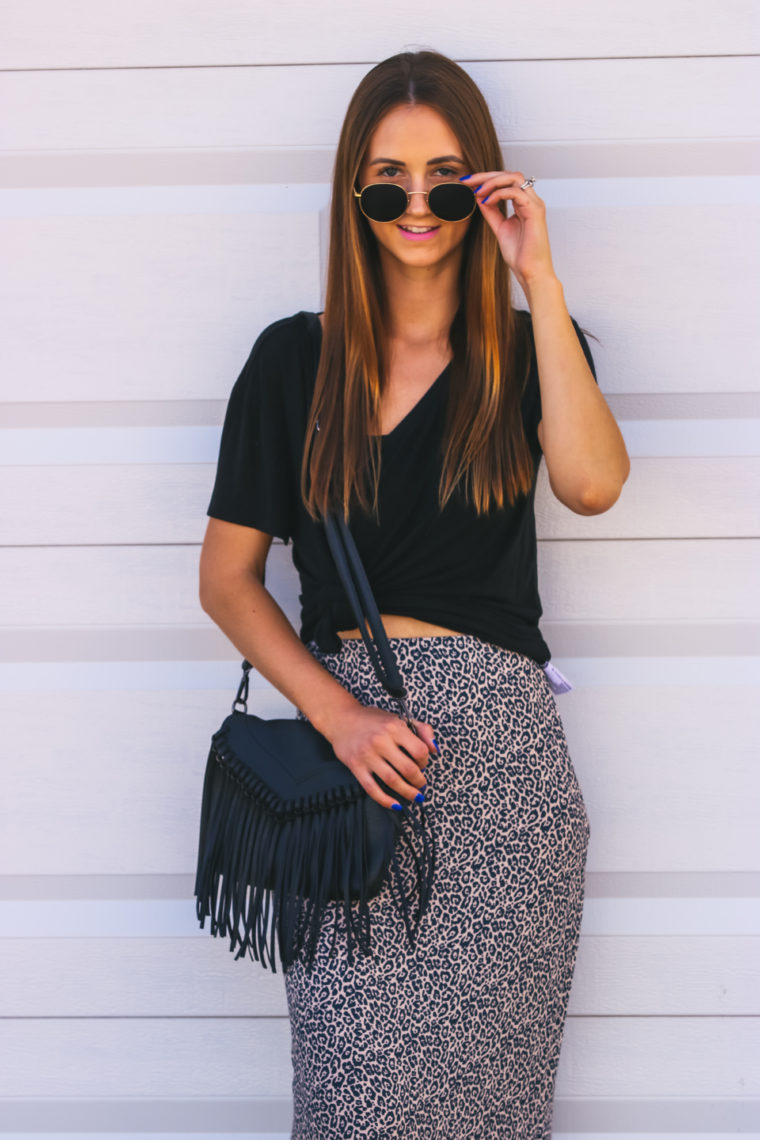 fringe bag, round sunglasses, leopard skirt