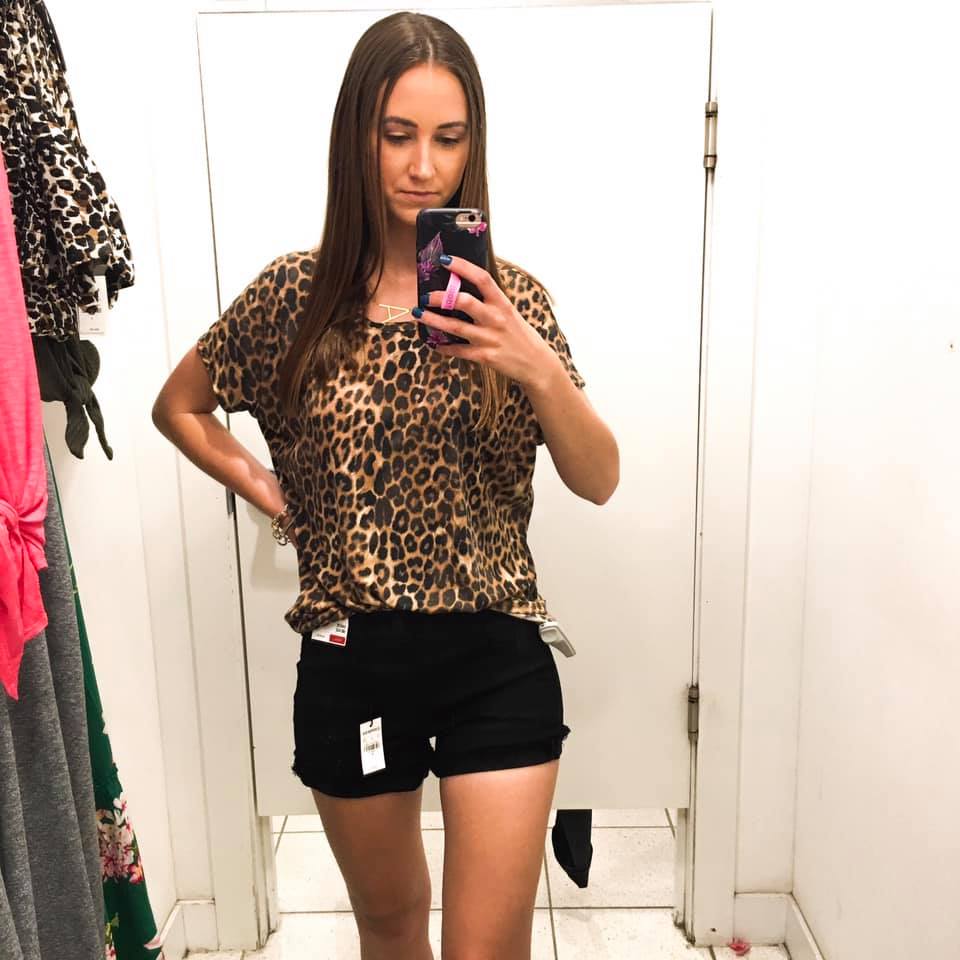 leopard tee, black shorts, try on session