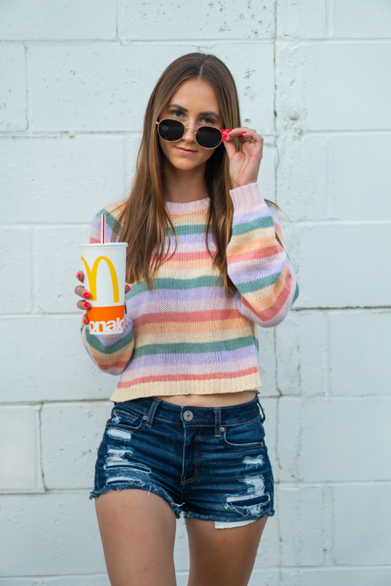sweater weather, striped sweater, round sunglasses