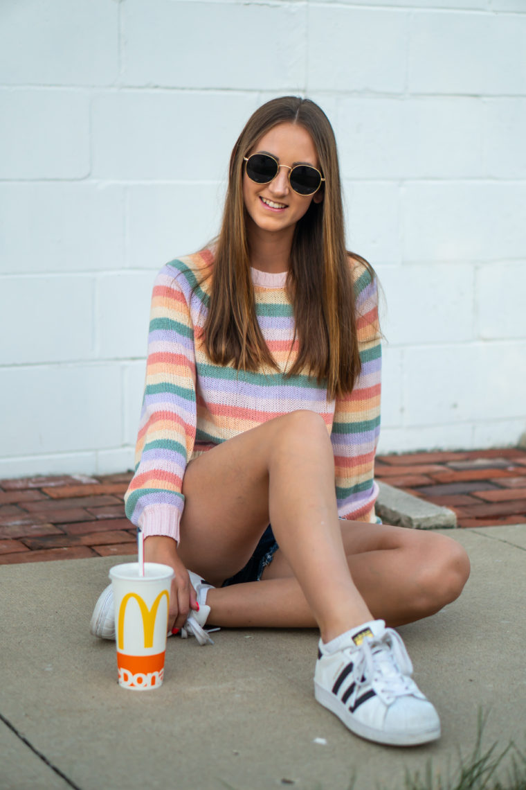 Adidas sneakers, striped pullover sweater, casual style