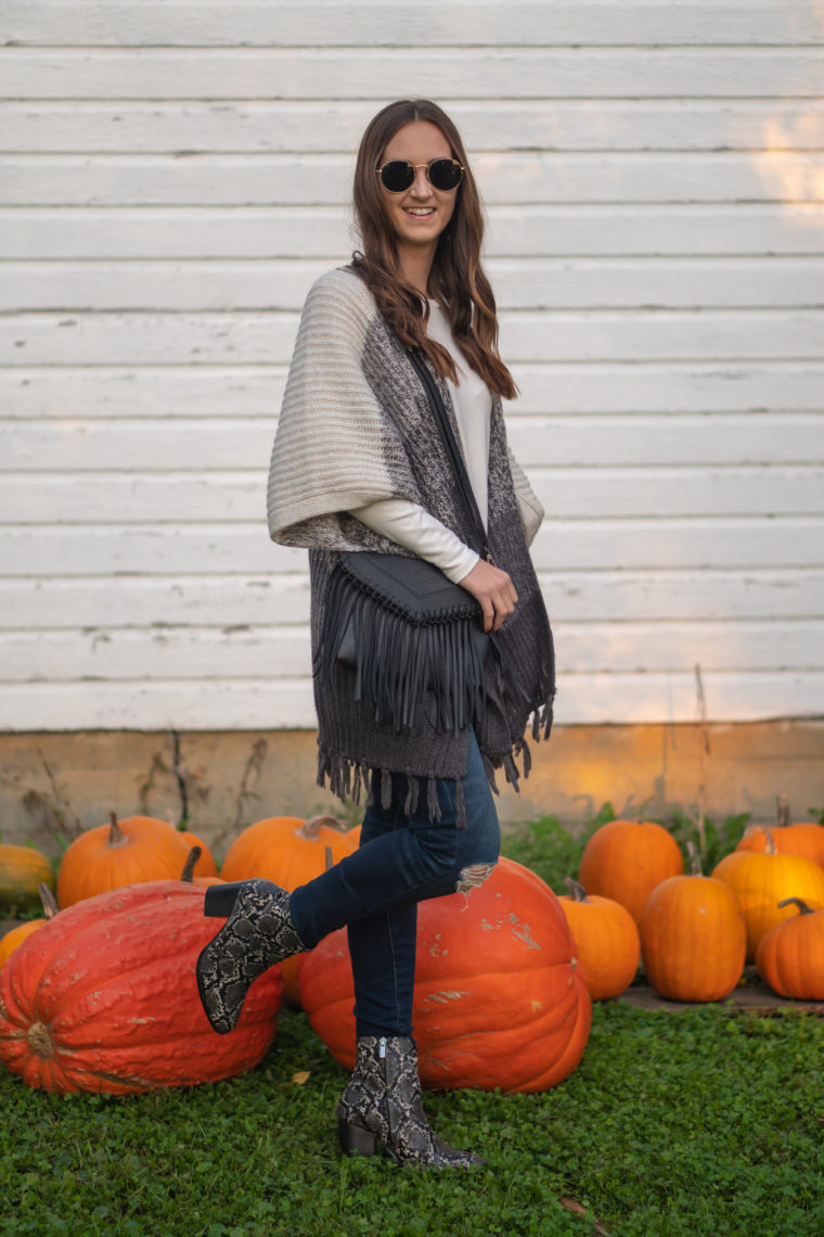 color block poncho, tassel bag, orange pumpkins