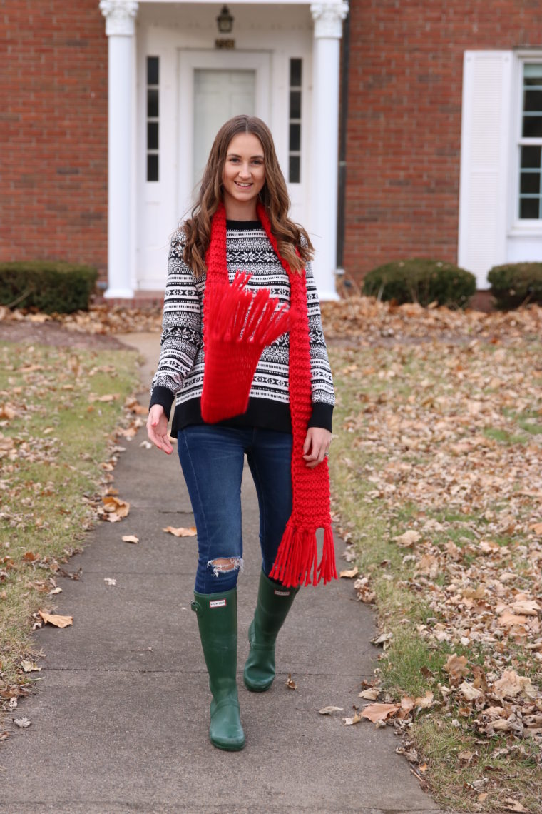 Hunter boots, holiday sweater, fringe scarf