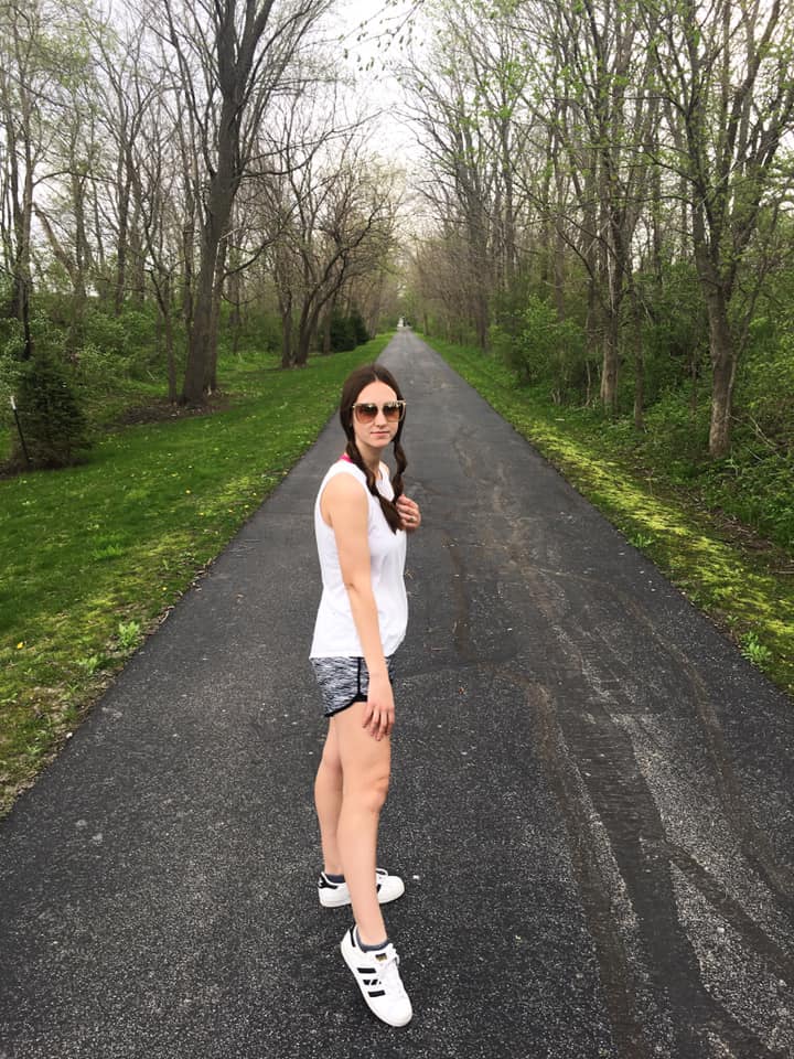 tank top, athletic shorts, Adidas shoes