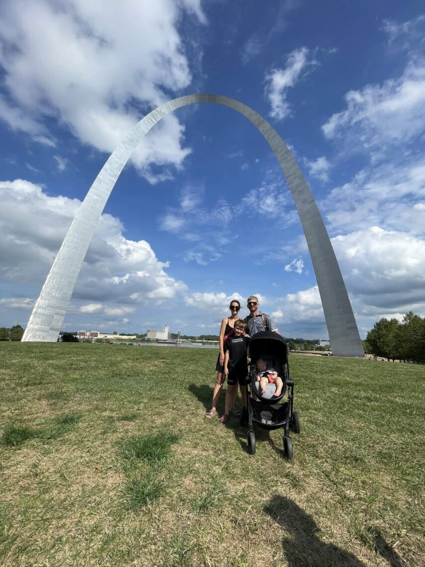 Family standing in front of the St. Louis Gateway Arch