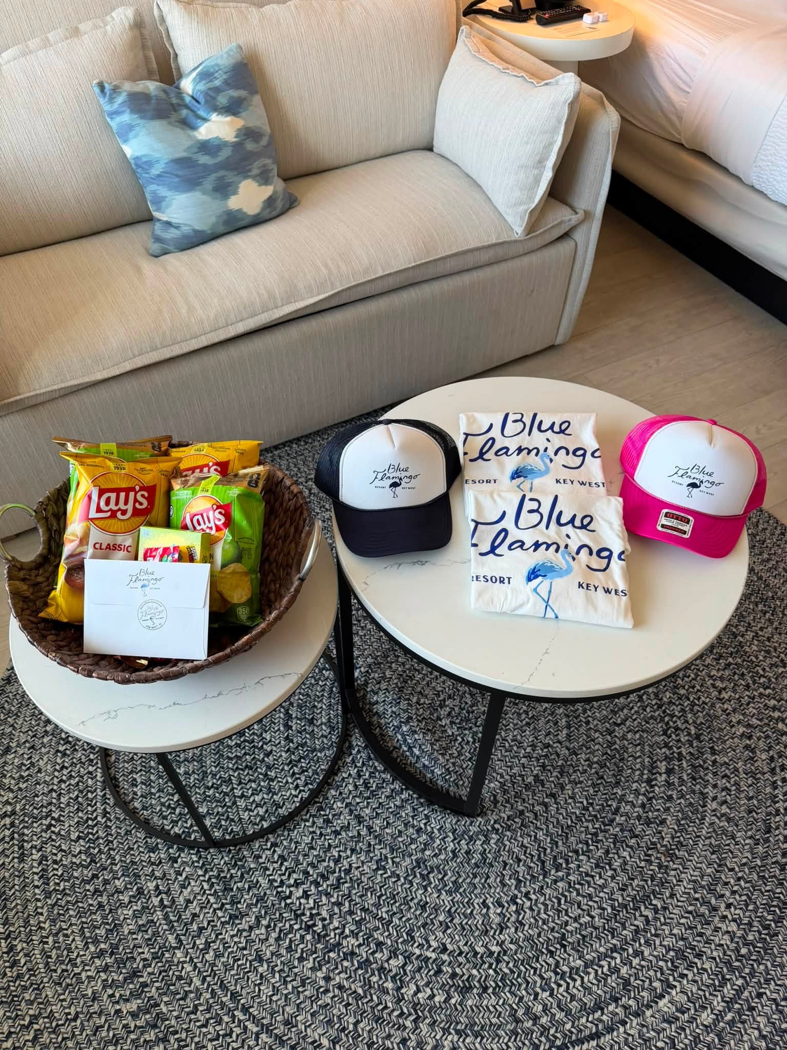 hats, shirts, and snacks from the Blue Flamingo Resort team